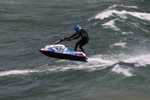 Surfing down a wave